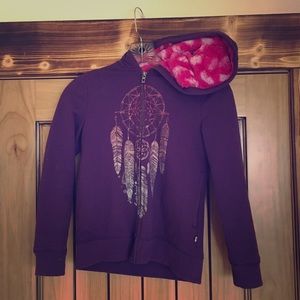 A soft and fuzzy youth sweatshirt/hoodie.